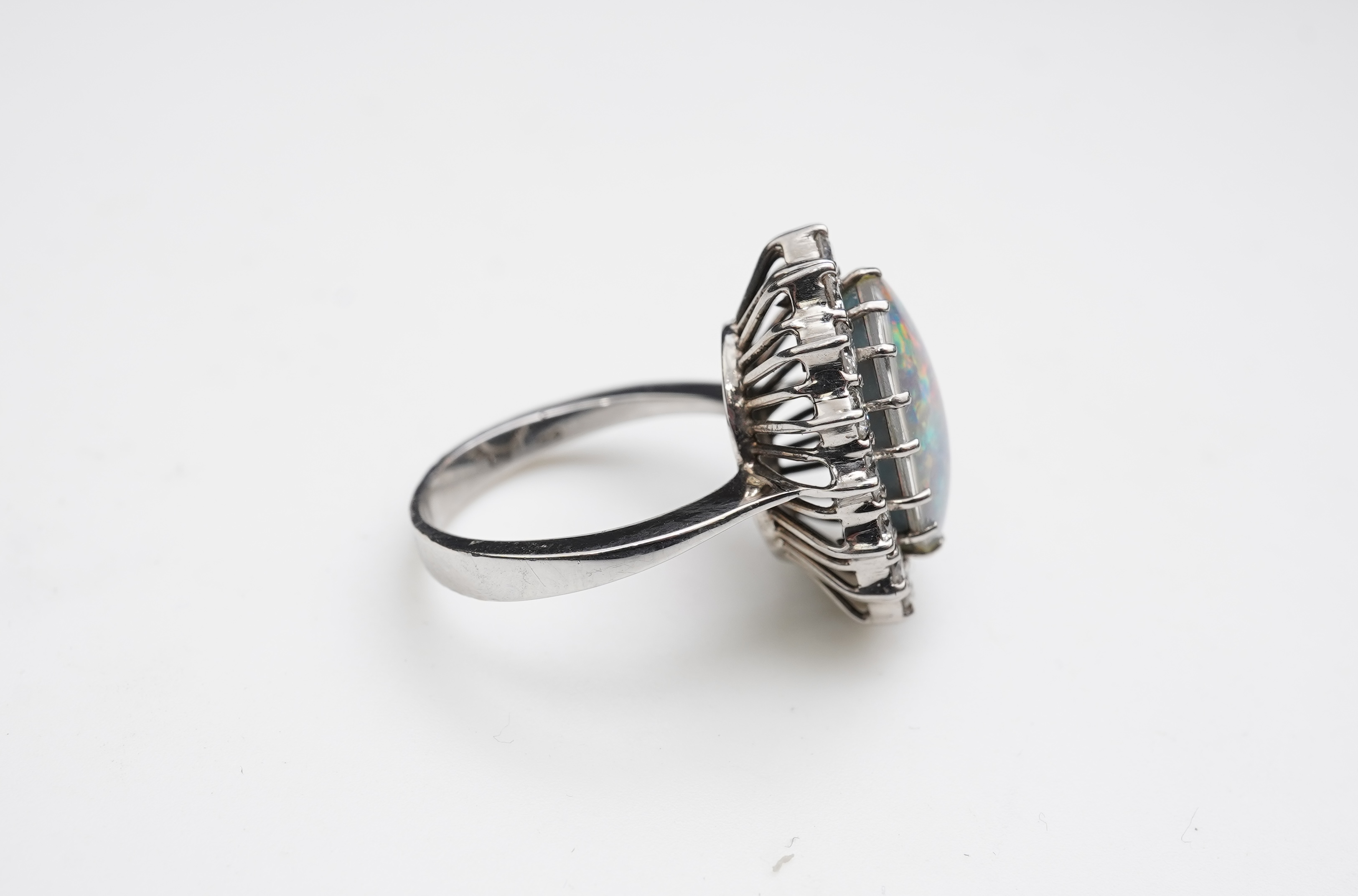 An opal triplet and diamond ring